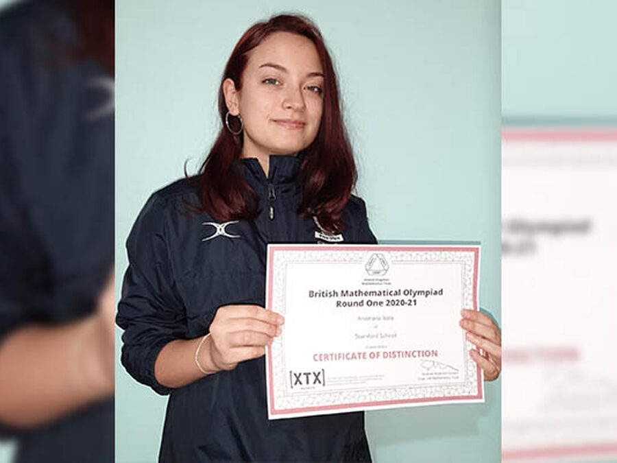 Ana scores within top 25% nationally in Maths Olympiad