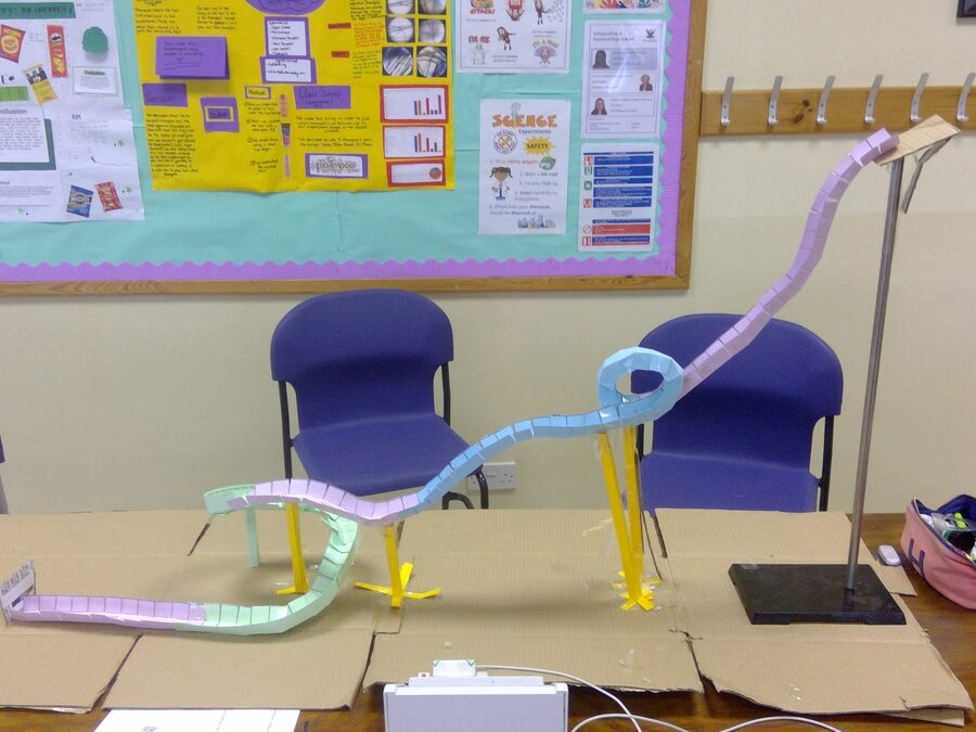 Investigating gravity with marble roller coasters